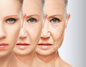 Three portrait images of the same person superimposed in a gradient. From left to right, the individual appears younger, middle-aged, and older, with wrinkles appearing and hair greying.